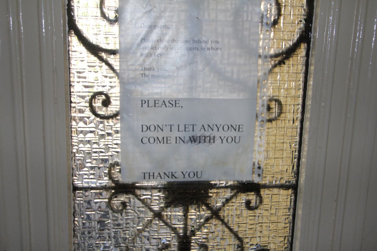 Don't let anyone come in you - Note on the door of the hostel in Amsterdam